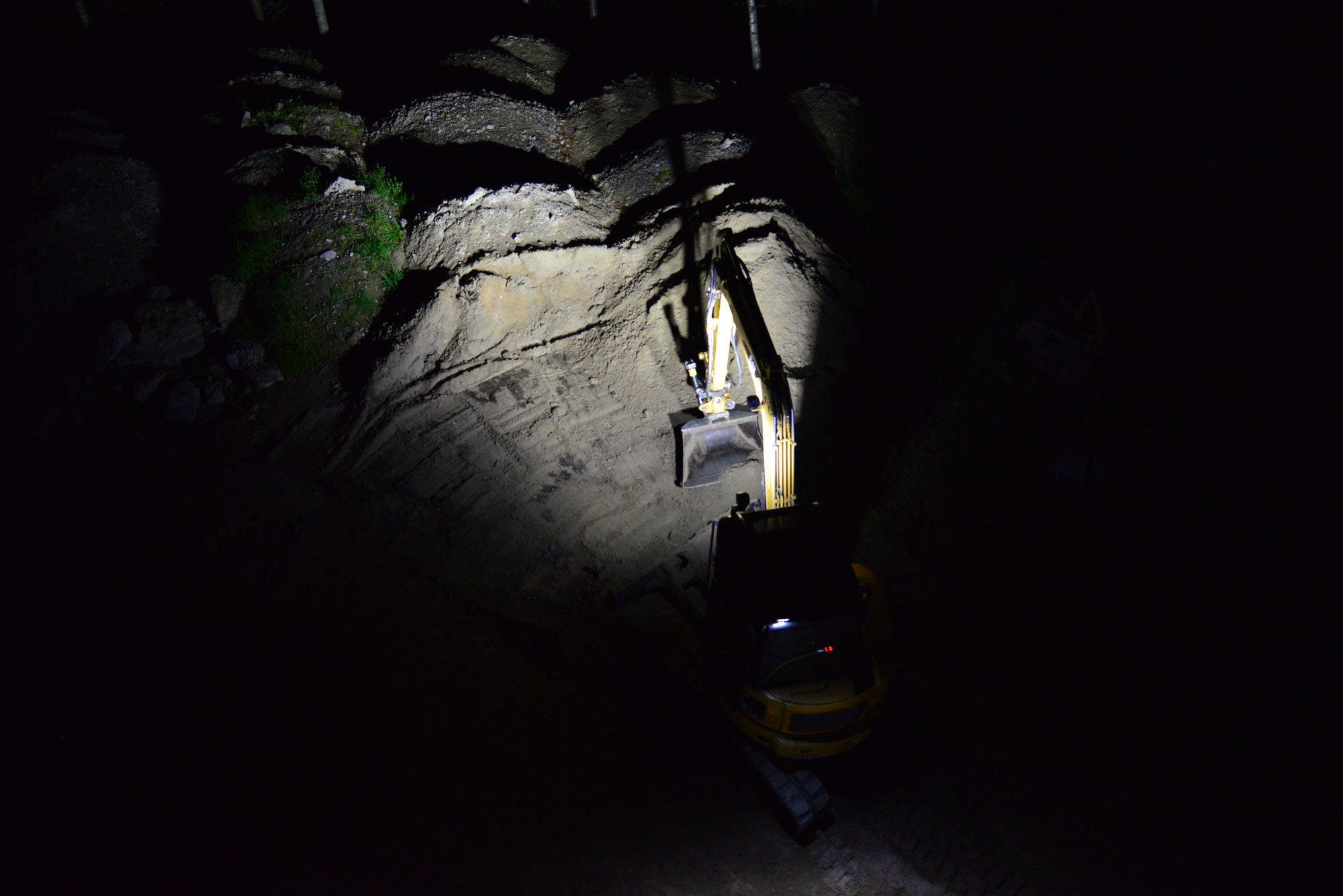 Small yellow excavator digging with Nordic Lights LED Work Lights